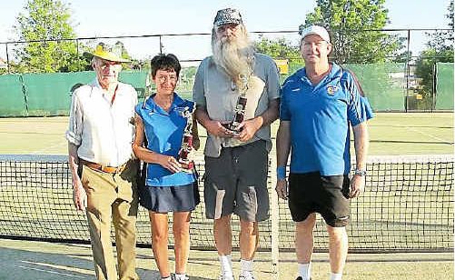 Gympie and District Veterans Tennis Association patron Ted Dray (far left) and president Warren Arnell (far right) congratulate Jenny Kachel and Trevor Krause on their Patron’s Day success. Gympie and District Veterans Tennis Association patron Ted Dray (far left) and president Warren Arnell (far right) congratulate Jenny Kachel and Trevor Krause on their Patron’s Day success.